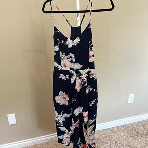 High/low blue floral dress with zipper back closure and adjustable straps